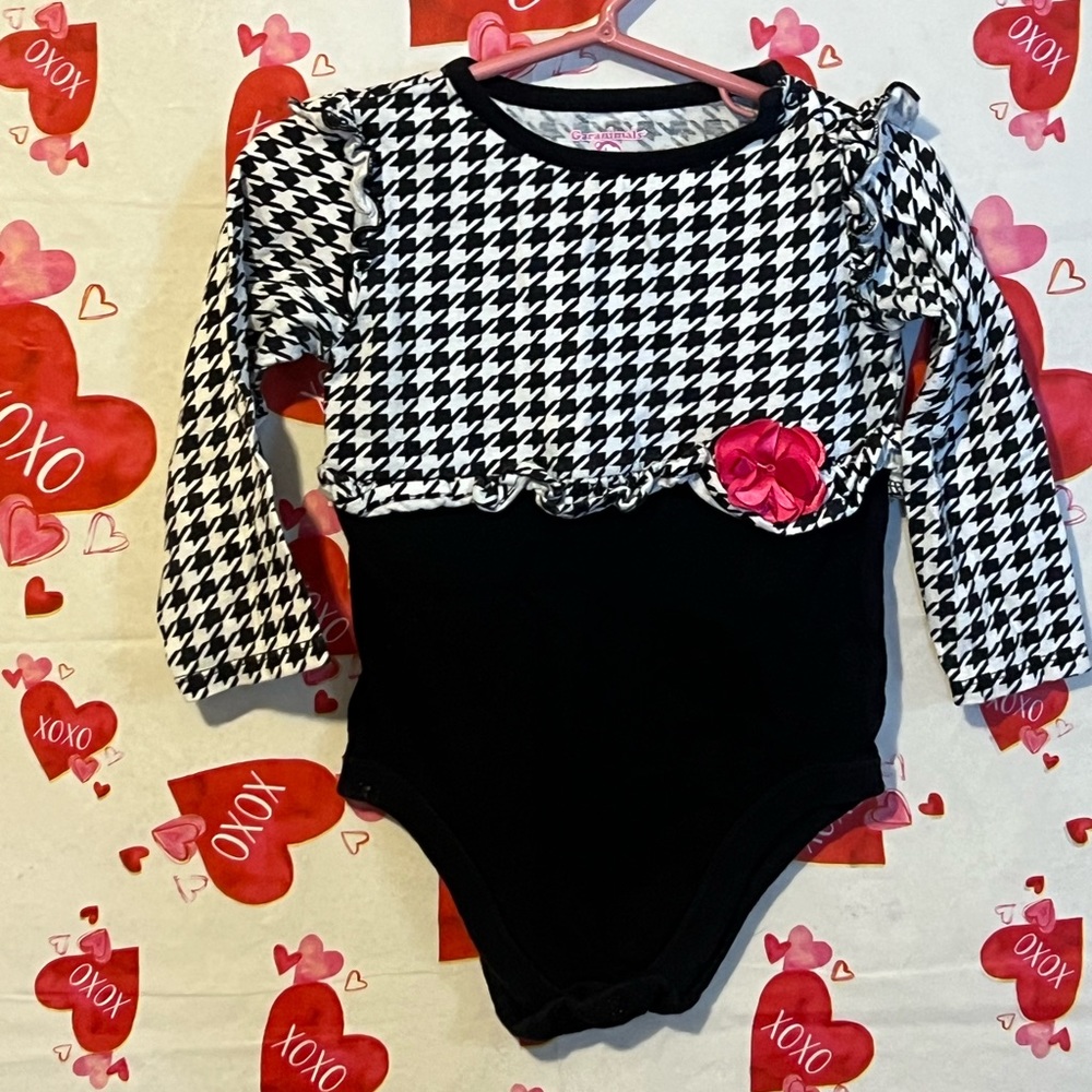 Garanimals Onesie sz 24 months. Black and white with cute ruffle detail
